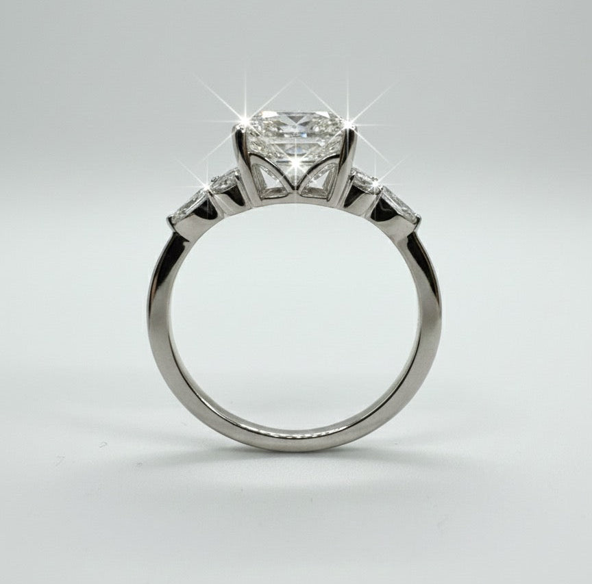 950 Platinum Asscher Cut Diamond With Round Brilliant And Marquees Diamond Shoulder Ring.