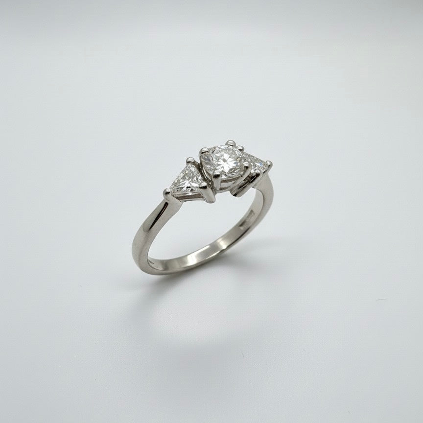 950 Platinum Trilogy Centre Round With Trillion Cut Side Diamond Ring