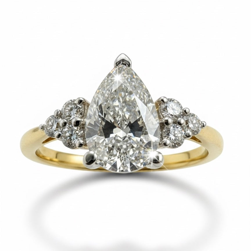18ct Diamond Pear With Diamond Round Brilliant Shoulder Ring