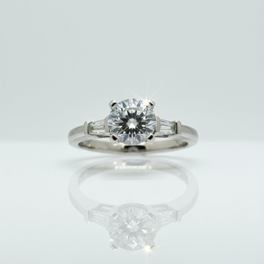 950 Platinum Round Brilliant And Baguette Trilogy Diamond Ring