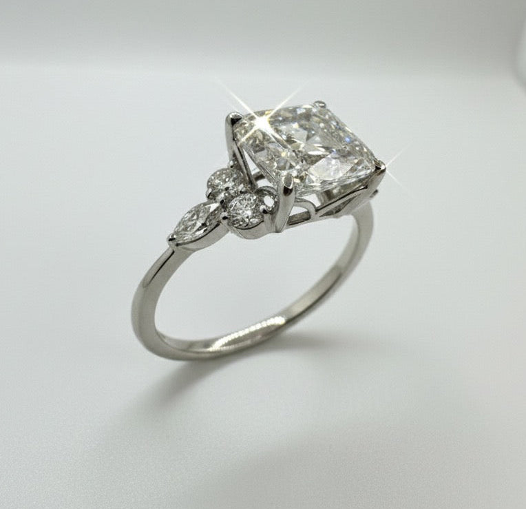 950 Platinum Asscher Cut Diamond With Round Brilliant And Marquees Diamond Shoulder Ring.