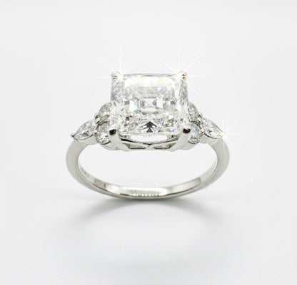 950 Platinum Asscher Cut Diamond With Round Brilliant And Marquees Diamond Shoulder Ring.