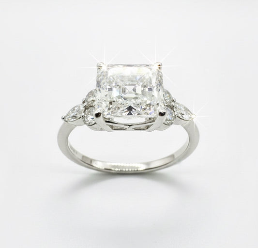 950 Platinum Asscher Cut Diamond With Round Brilliant And Marquees Diamond Shoulder Ring.