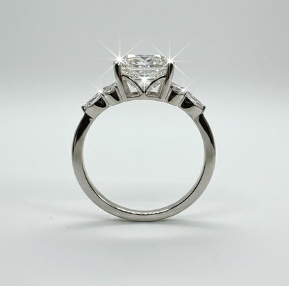 950 Platinum Asscher Cut Diamond With Round Brilliant And Marquees Diamond Shoulder Ring.