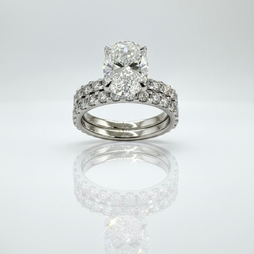 950 Platinum Oval Diamond With Diamond Shoulders And Matching Eternity Ring Set