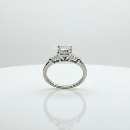 950 Platinum Round Brilliant And Baguette Trilogy Diamond Ring