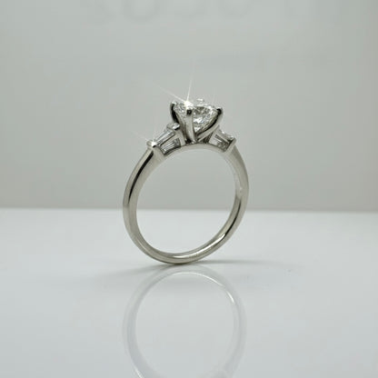 950 Platinum Round Brilliant And Baguette Trilogy Diamond Ring
