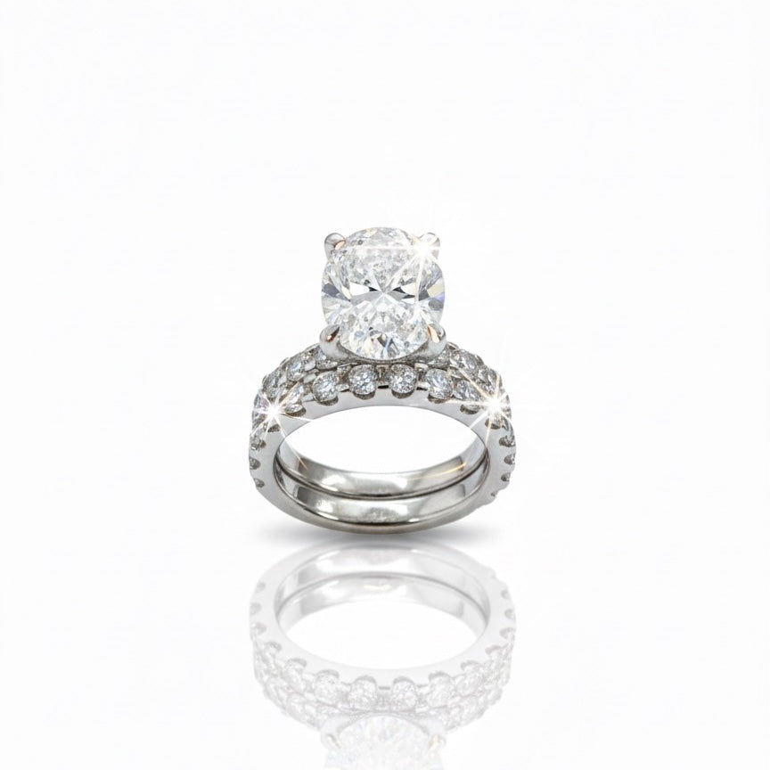 950 Platinum Oval Diamond With Diamond Shoulders And Matching Eternity Ring Set