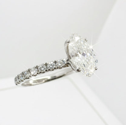 950 Platinum Oval Diamond with Diamond Shoulder Ring
