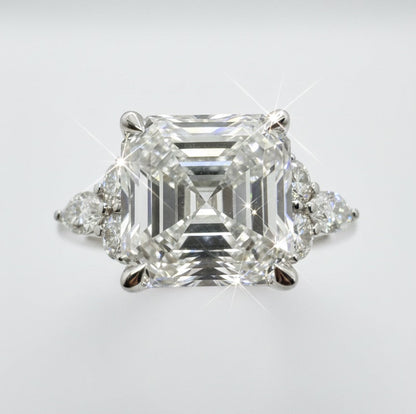 950 Platinum Asscher Cut Diamond With Round Brilliant And Marquees Diamond Shoulder Ring.