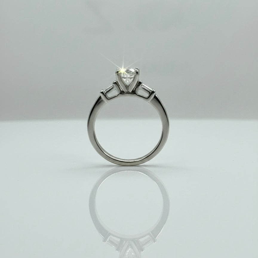 950 Platinum Round Brilliant And Baguette Trilogy Diamond Ring