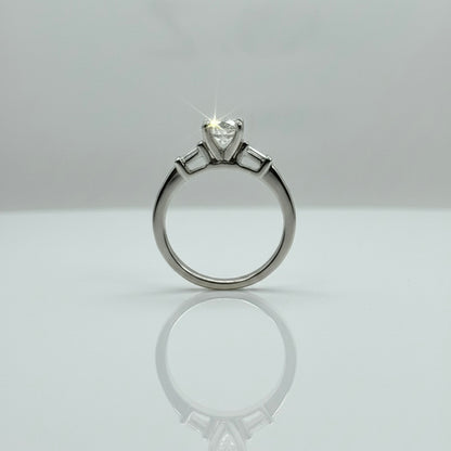 950 Platinum Round Brilliant And Baguette Trilogy Diamond Ring
